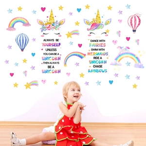 Close-up of unicorn wall sticker set with rainbow and hot air balloon motifs