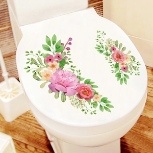 Détail de stickers de toilette imperméables avec motifs de fleurs roses et feuilles