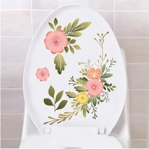 Autocollant de toilette floral avec des fleurs roses et oranges sur fond blanc