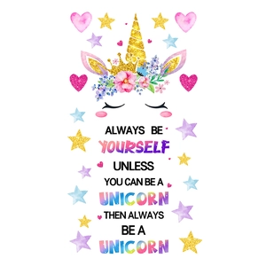 Detail of unicorn wall sticker featuring golden horn, floral wreath and quote ALWAYS BE YOURSELF