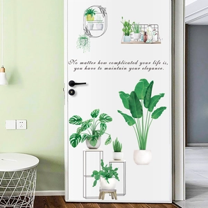 Adesivi murali con piante verdi realistiche e citazione ispiratrice per decorare porte