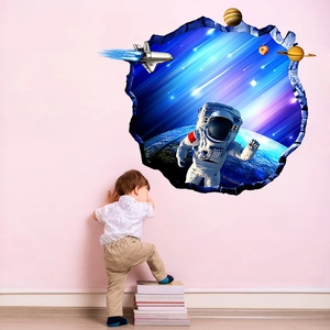 Detailed 3D space wall sticker featuring an astronaut and planets for kids room decor