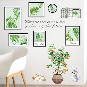 Nordic wall stickers with potted green leaves, cat motifs, and inspirational quotes on a wall
