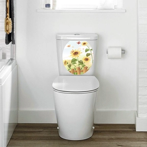 Detailed view of sunflower toilet seat sticker with butterfly and fence patterns
