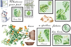 Detail of PVC wall stickers featuring hand-painted cats, green plants, and orange tree