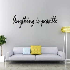 Inspirational 'Anything is possible' black wall decal in a modern living room