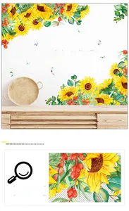 Detail of sunflower wall decal with butterflies and inspirational English quote on white wall