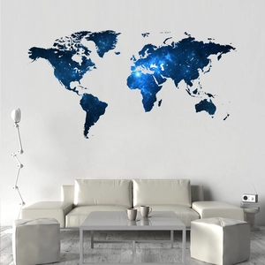 Detail of world map wall sticker featuring deep blue nebula patterns on a white wall