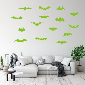 Detailed view of glow-in-the-dark bat wall stickers set for Halloween room decoration