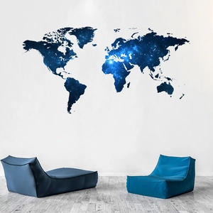 Blue galaxy world map wall decal shown in a modern living room with blue bean bag chairs