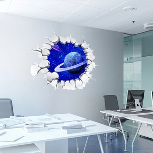 Detailed 3D outer space broken wall decal featuring a deep blue galaxy and ringed planet