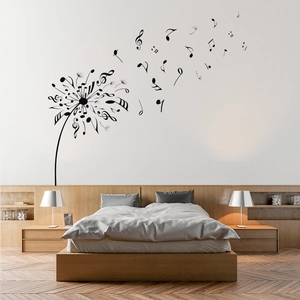 Dandelion music notes wall sticker displayed above a bed in a cozy modern bedroom setting