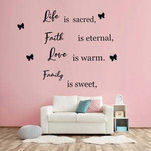 Detail showing Life, Faith, Love, Family text wall decals with butterfly accents