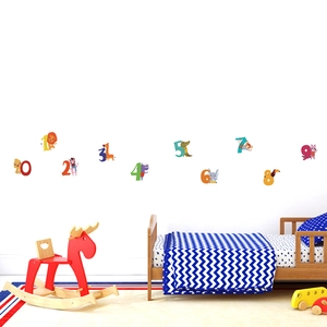 Detail view of colorful cartoon animal wall stickers with numbers 0 to 9 for nursery decor