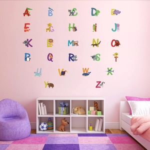 Alphabet wall stickers with cute animals displayed in a cozy pink kid's bedroom setting