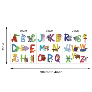Detail view of colorful A-Z alphabet wall stickers with animals and size measurements