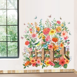 Detailed view of colorful flower garden wall stickers with butterflies on a white wall