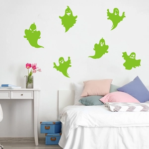 Luminous ghost wall stickers in bright green for Halloween themed bedroom wall decor