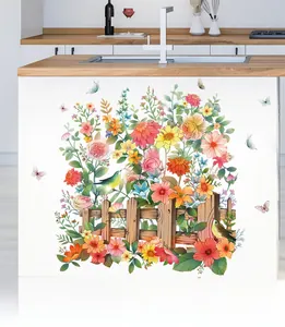 Detail of colorful floral wall stickers with butterflies on a modern kitchen island