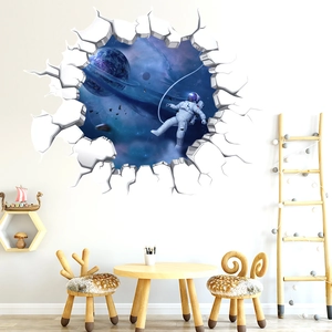 Child room setting featuring 3D wall stickers with astronauts and purple galaxies