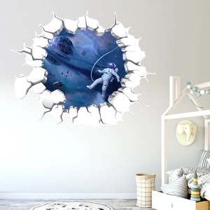 Detailed 3D wall decal showing an astronaut and planets through a cracked wall effect