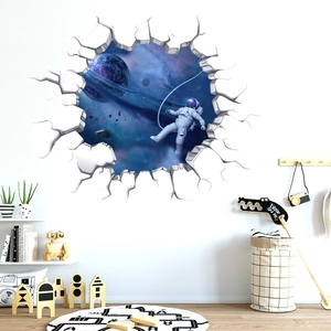 Detailed 3D wall sticker featuring a spacewalking astronaut and a deep space cracked wall design