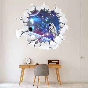 3D space wall decal showing an astronaut and star galaxy breaking through the office wall