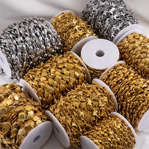 Rolls of gold and silver stainless steel DIY jewelry chains in butterfly and leaf shapes
