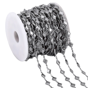 Rhombus link stainless steel chain on a white spool for DIY jewelry making and crafts