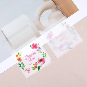 Translucent self-adhesive bag with colorful floral patterns and Thank You print