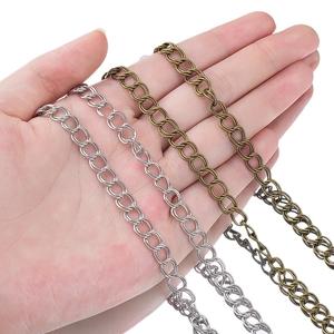 Catene in metallo bronzo e argento per borse e cinture in pelle fai-da-te in mano