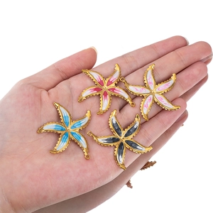 Set of four colorful enamel starfish pendants in gold-plated stainless steel for DIY jewelry