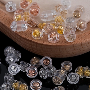 Silicone earring backs with gold and silver butterfly metal cores in 100 piece set