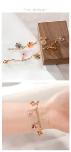 Makroaufnahme von 304 Edelstahl Armband mit bunten Kristall Gänseblümchen Anhängern