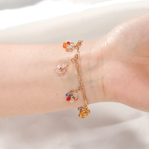 Daisy Armband aus 304 Edelstahl mit bunten Kristallblütenanhängern an einer Goldkette