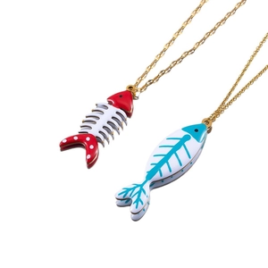 Set of two fish and fishbone enamel pendants on golden stainless steel necklaces