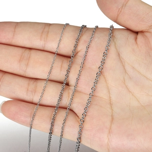 Four different widths of stainless steel O-link chains displayed on a palm for DIY jewelry