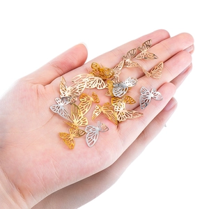 50 pieces of hollow asymmetrical metal butterflies in gold silver and rose gold finishes