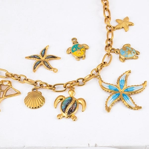 Golden ocean series jewelry charms with sea turtle and starfish in abalone shell inlay