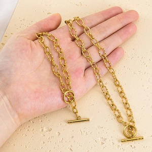Gold stainless steel OT toggle clasp chain necklace with twisted textured oval links