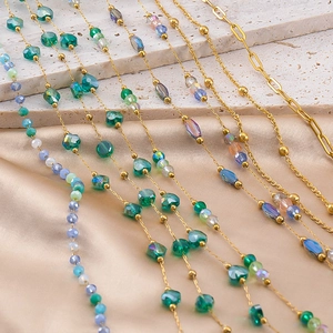 Blue-green crystal beads on gold stainless steel chains in various handmade DIY styles