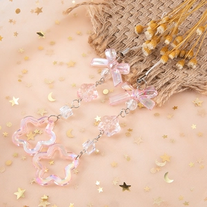 Sweet iridescent pink bow and hollow star charm keychain with silver links and white cord