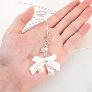Charmant porte-clés à nœud et perles avec pendentif étoile pour sacs et téléphones