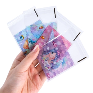 Transparent self-adhesive bags with colorful cartoon mermaid and ocean card inserts
