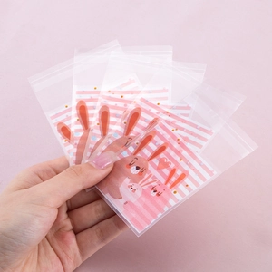 Bolsas transparentes autoadhesivas con lindo diseño de conejo para galletas y dulces