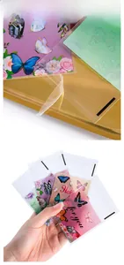 Detailed view of clear self-adhesive candy bags with butterfly decorative cards