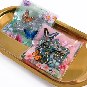Floral and butterfly self-adhesive gift bags for jewelry packaging in pink and green