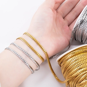 Polished 4mm stainless steel embossed NK chain bracelet in gold and silver finish
