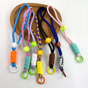 Adjustable braided crossbody phone lanyard straps in various vibrant colors and patterns