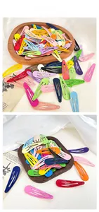 Colorful water drop metal BB hair clips in various candy colors displayed on wooden trays